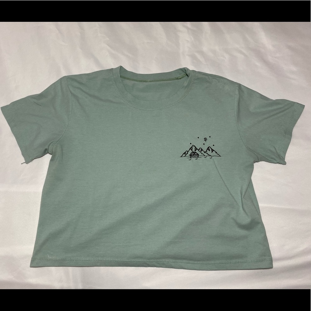 light blue/green crop top